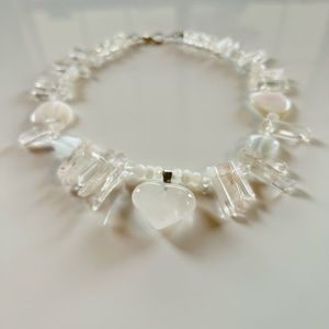 Handmade rock crystal and bead choker with heart-shaped crystal heart.